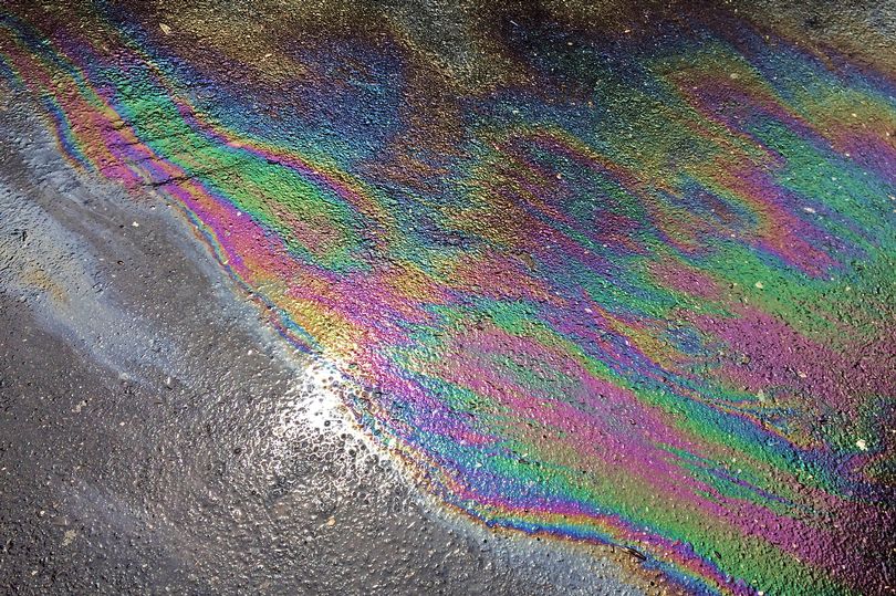 oil rainbow on road, beware