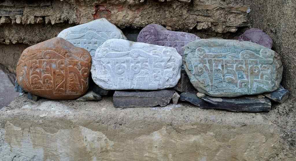 Carved stones in three different colors